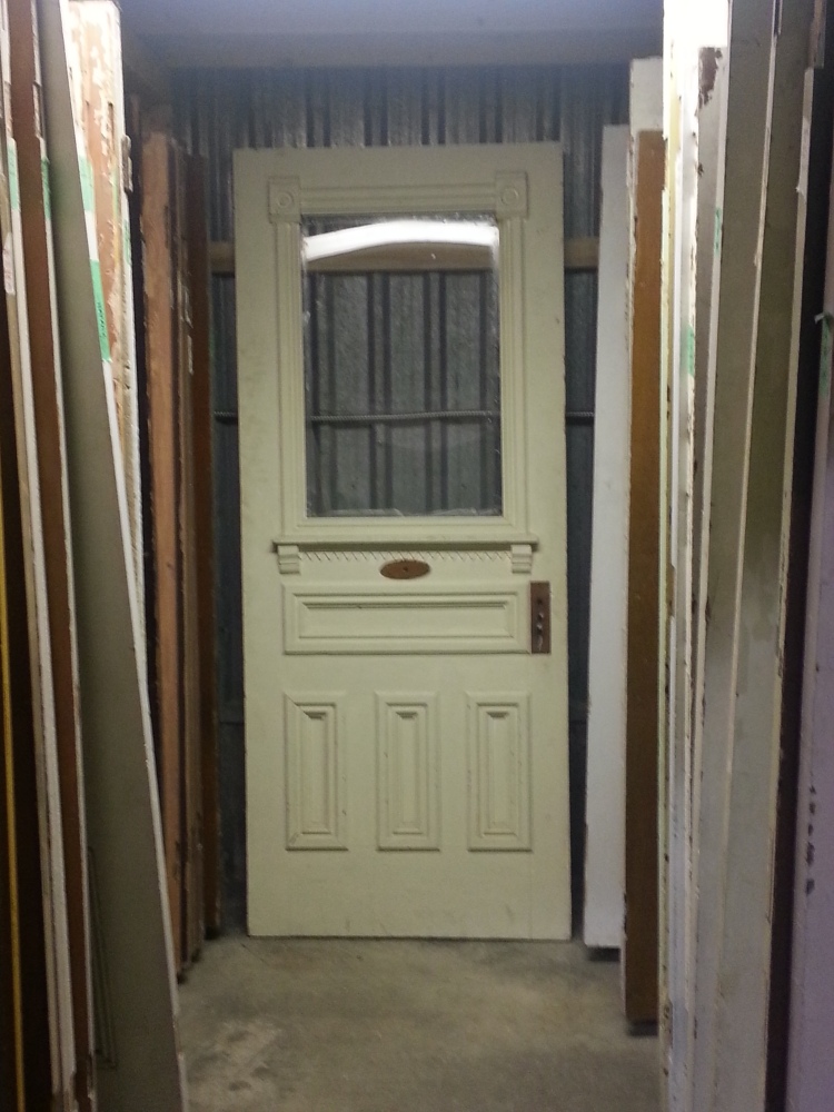 This door is a better size for my space, but I'm not sure about the colour.  I like the idea of keeping the original finish on whatever I use -- I think it's the patina that makes these pieces more interesting than new items, so it seems silly to refinish it.